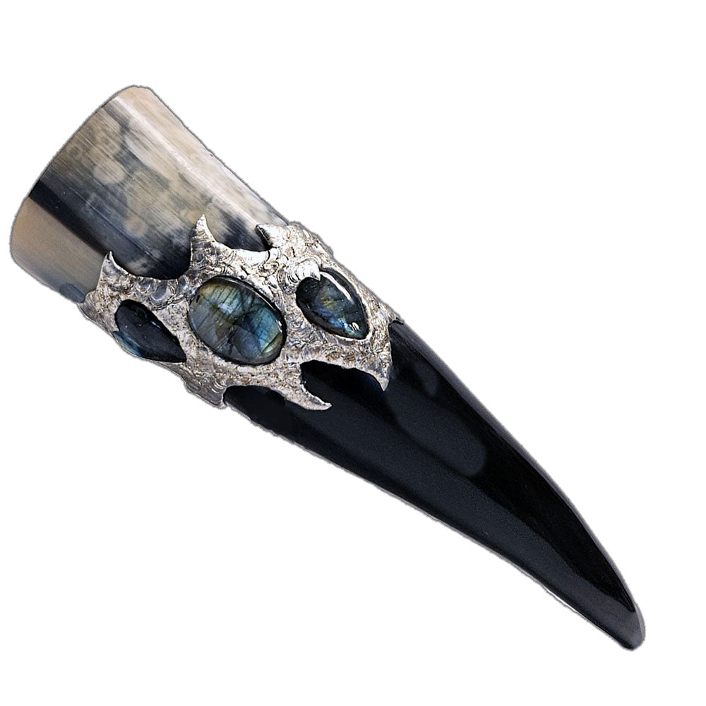 a drinking horn made from steer with three labradorite cabochon two are transformed into hearts