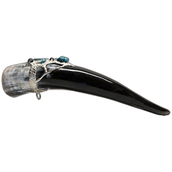a drinking horn made from steer, turquoise cabochon, a large turquoise nugget and two small turquoise nuggets and three mermaid tears side view