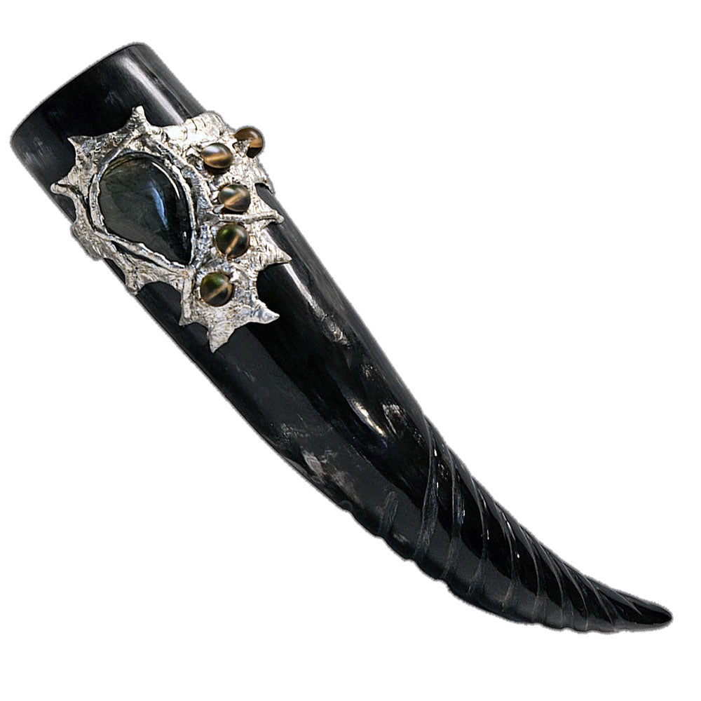 a drinking horn made from steer, carved spiral at the bottom with a labradorite cabochon and five mermaid tears