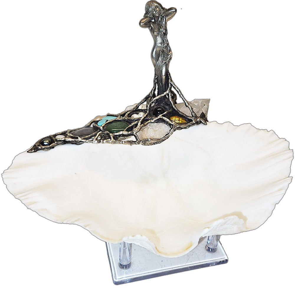 a luminous clam shell with a standing water nymph adorned in turquoise, labradorite, emerald, quartz, pearls, amethyst, and ruby. A talisman of elemental balance, spiritual renewal, and oceanic enchantment