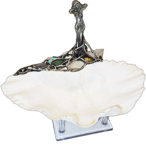 a luminous clam shell with a standing water nymph adorned in turquoise, labradorite, emerald, quartz, pearls, amethyst, and ruby. A talisman of elemental balance, spiritual renewal, and oceanic enchantment