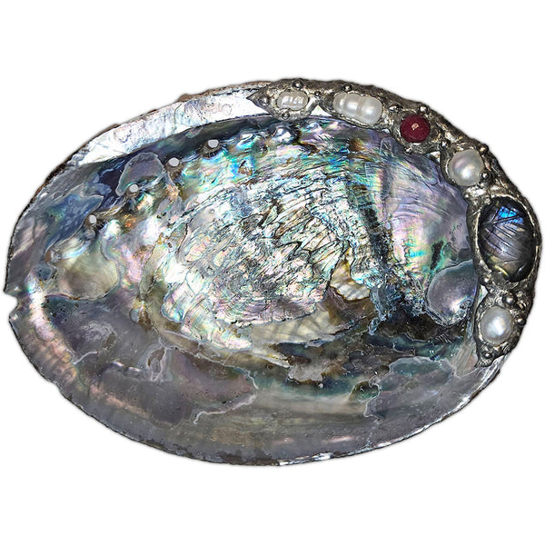Decorative abalone shell with a labradorite carved cabochon, white pearls and a ruby crystal ball