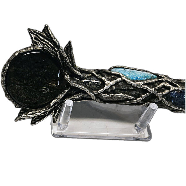 close up of obsidian disk