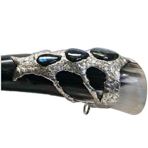 a drinking horn made from steer with three labradorite cabochon