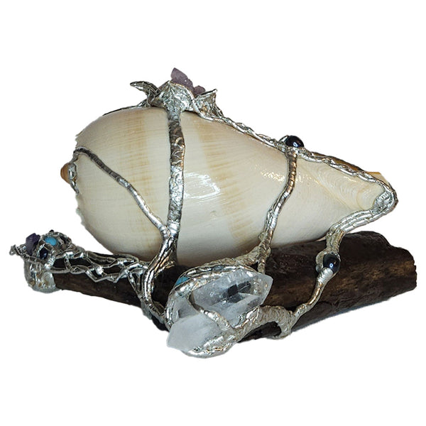 Melon shell on driftwood with amethyst. black pearls and turquoise. Back view.