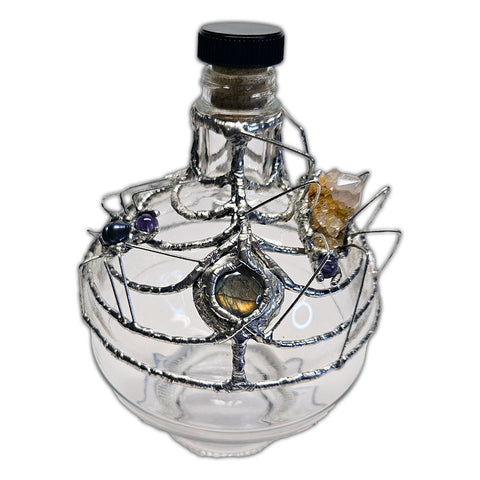 bedazzled spider web glass decanter with labradorite amethyst and black pearls