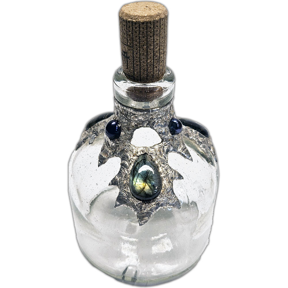 Repurposed bottle decanter adorned with three shimmering labradorite cabochons and three mysterious black pearls—an ocean’s enchantment captured in glass side 3