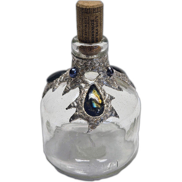 Repurposed bottle decanter adorned with three shimmering labradorite cabochons and three mysterious black pearls—an ocean’s enchantment captured in glass side 2