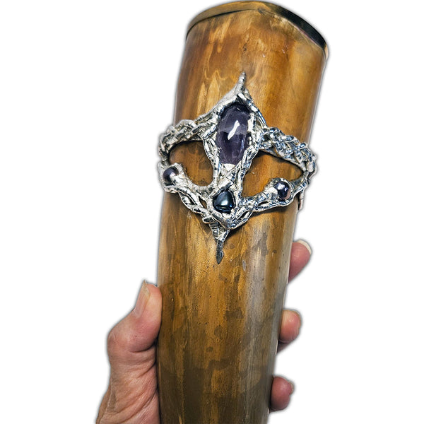 drinking horn with amethyst and black pearls close up