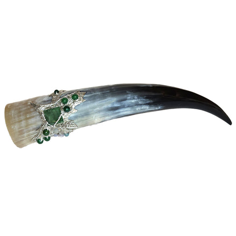 Beautiful emerald encrusted drinking horn. There's large square emerald cabochon set at center, eight emerald balls and two white coin pearls. Bedazzled and whimsical.