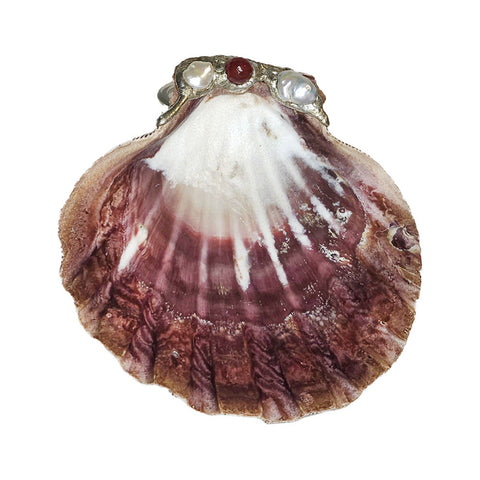 lion paw shell dish has a single ruby crystal faceted ball and two white pearls