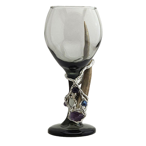 Amethyst balls wrap around a deer antler on a 13.5 oz smoky red wine glass. There is also a gorgeous Tahitian black pearl set right above the amethyst point at the tip of the antler. A whimsical and magical wine glass for sure. Front view