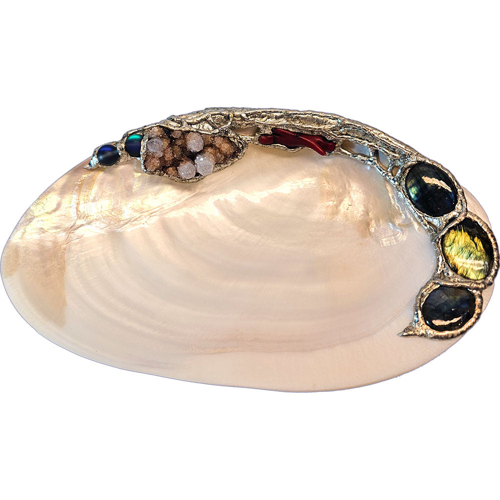 River clam shell jewelry dish with amethyst, labradorite, red branch coral and mermaid tears top view