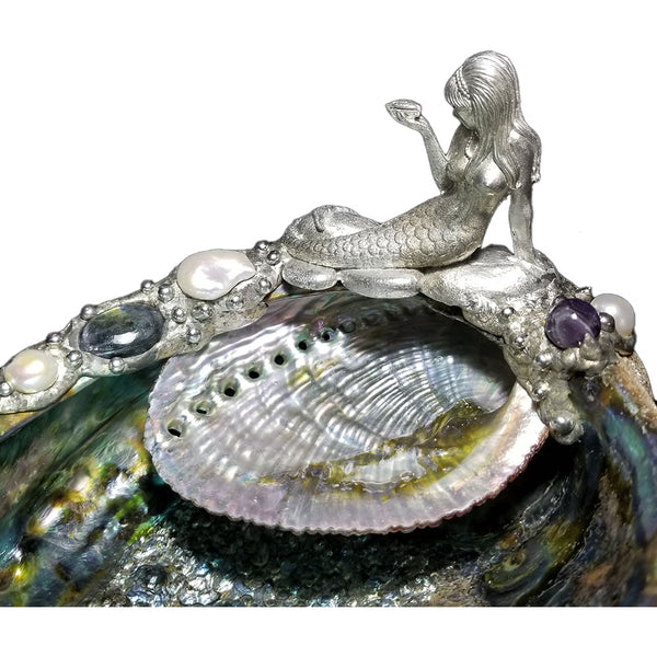 Close up of mermaid on a double abalone shell jewelry bowl