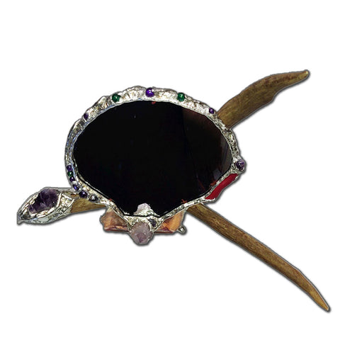 Table top scallop shell mirror on a deer antler. With amethyst, white coin pearls, red branch coral and a amethyst spirit quartz point. Front view.